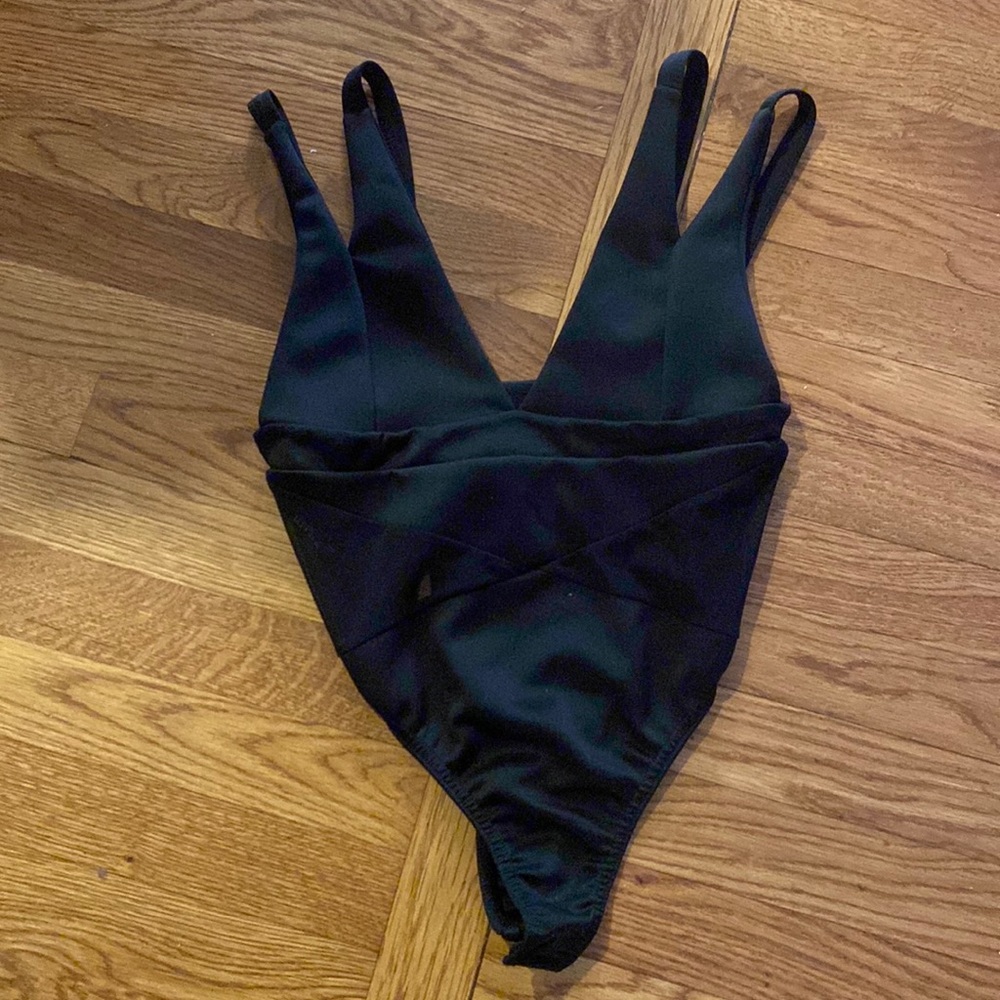 Nasty gal black bodysuit. Sheer midsection. Size 4
